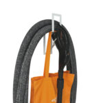 particolare supporto con tubo flessibile e impugnatura